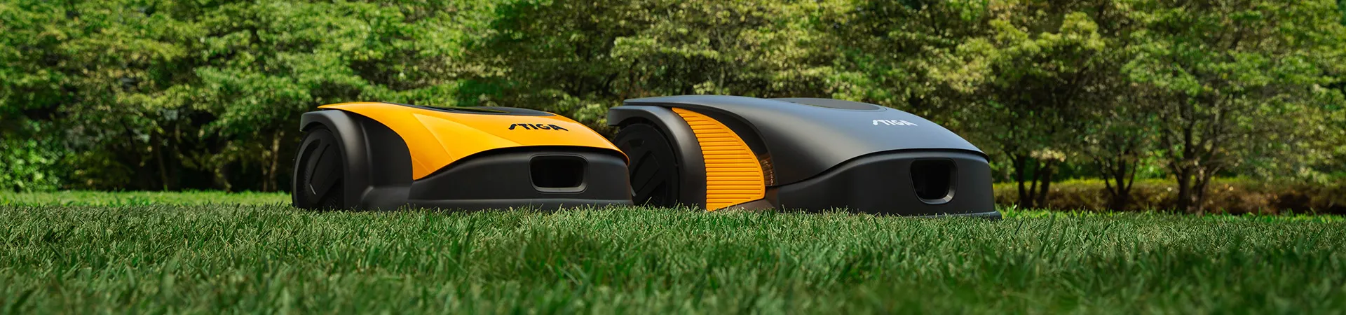 Front view of the new STIGA autonomous robot mowers in the garden